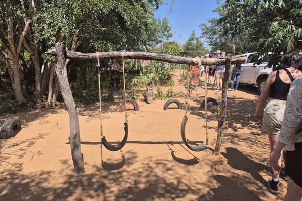 Tyre swing at Nakawa Community School in Zambia by Anna Campbell