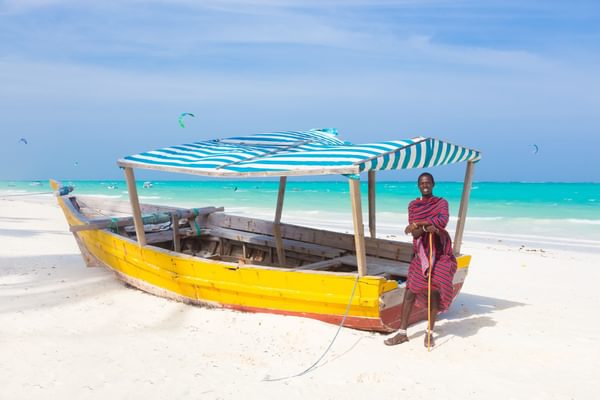 African man with a boat Zanzibar