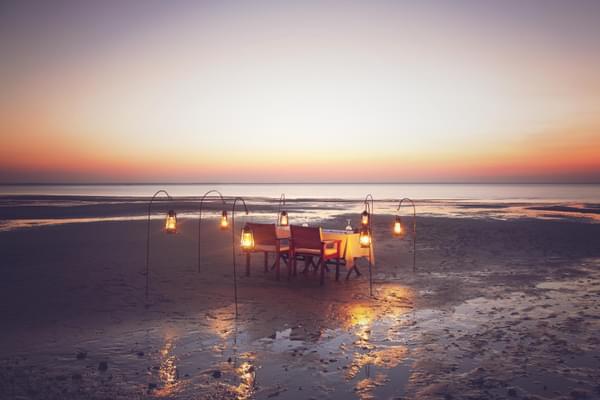 Azura benguerra dining on beach 2