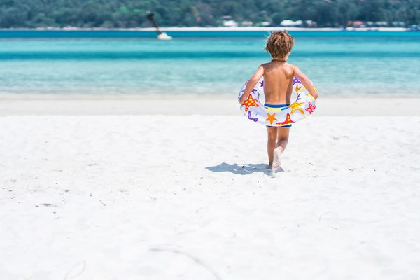 Child on the Beach Spice Island resort Grenada Caribbean