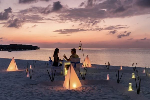 Couple on beach at night thailand canva