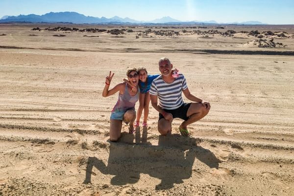 Family in Egyptian desert Canva Pro