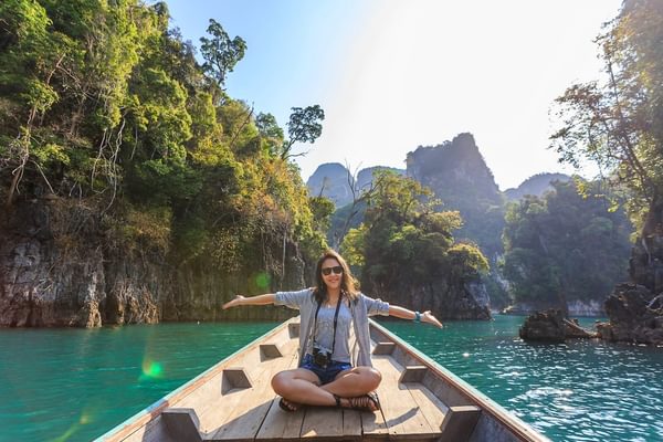 Karsts in thailand woman on a boat