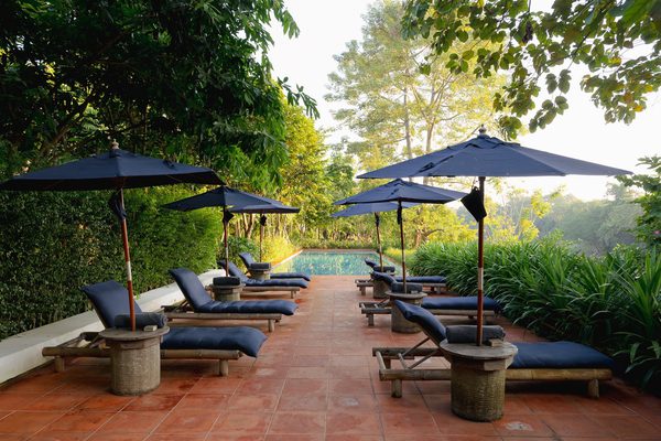 Pool with sunbeds raya heritage chiang mai thailand facebook page