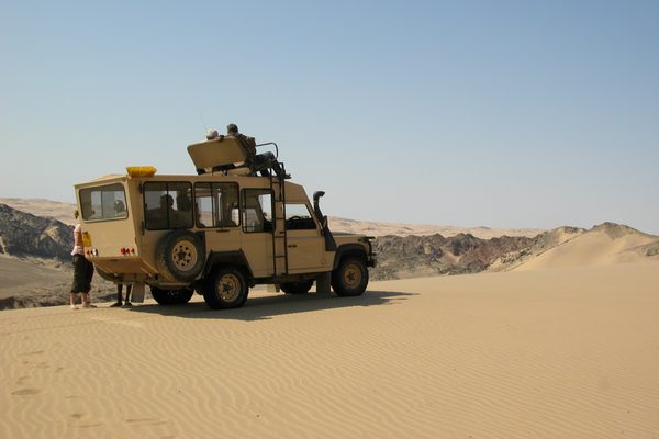 Sandy driving Skeleton Coast Namibia