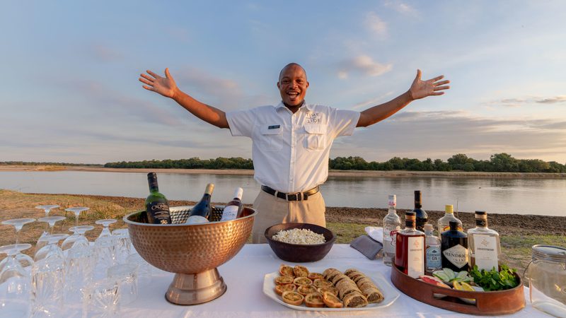 Sundowner drinks Time Tide Chinzombo Zambia