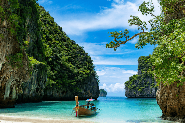 Boat in Loh Samah Bay in Phi Phi Island Thailand Canva Pro